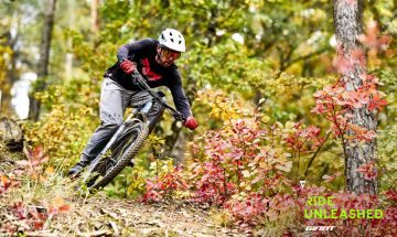 Mountain biker in riding during fall