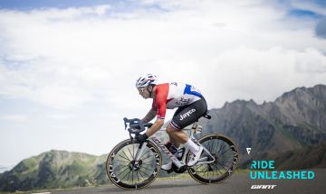 Road cyclist racing on a mountain